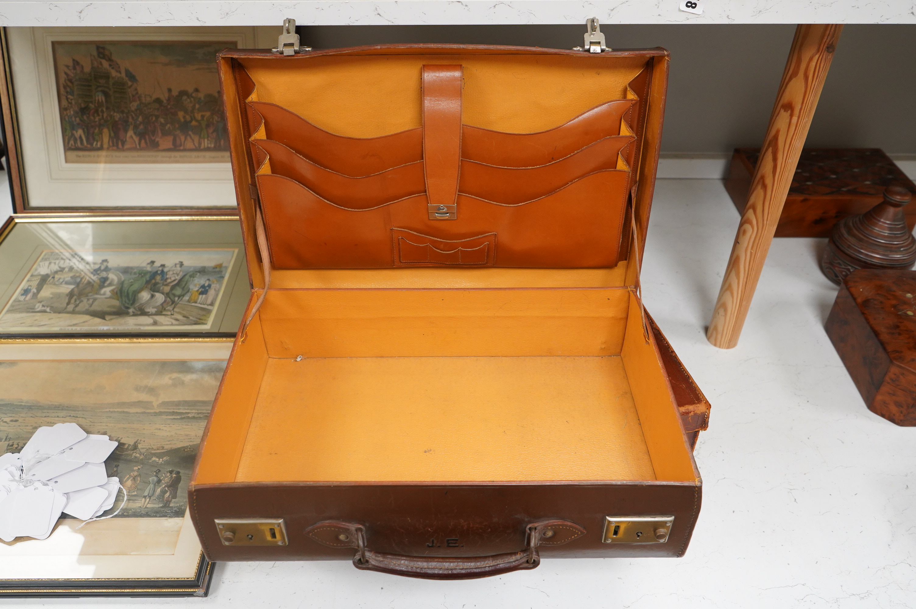 Three small vintage leather cases, largest 45cm wide